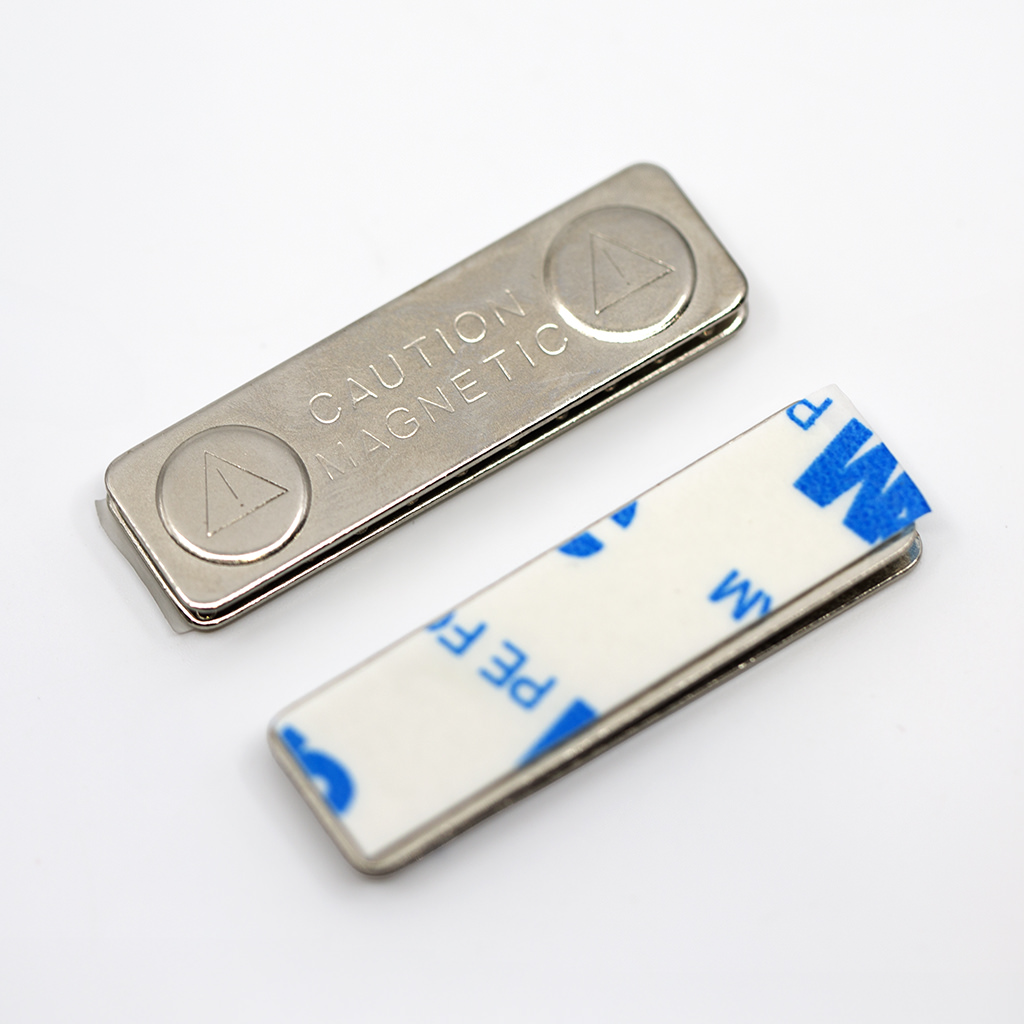 Magnetic name badge backing with adhesive strip for attaching badges securely